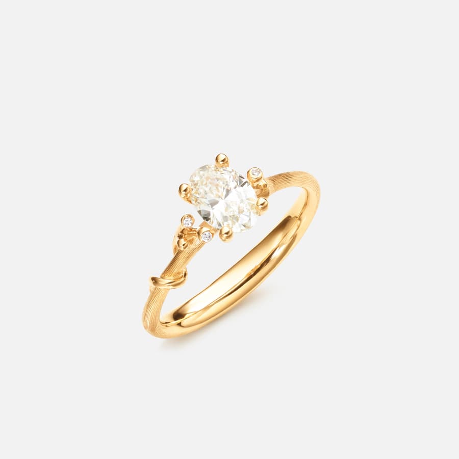 Nature Solitaire ring in 18k Gold with Oval center Diamond and 3 small white Diamonds | Slim shank | Ole Lynggaard Copenhagen